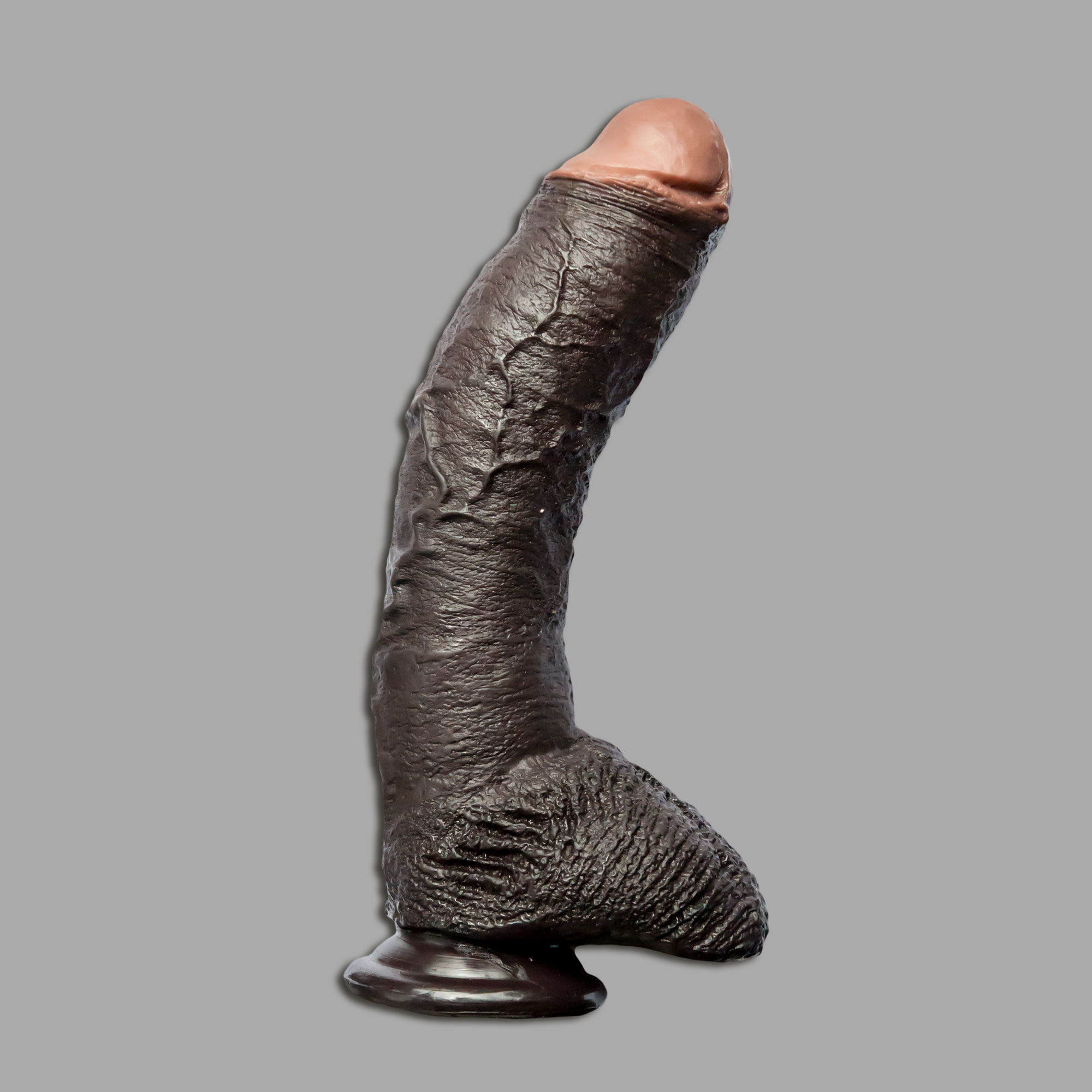 Black realistic dildo. 